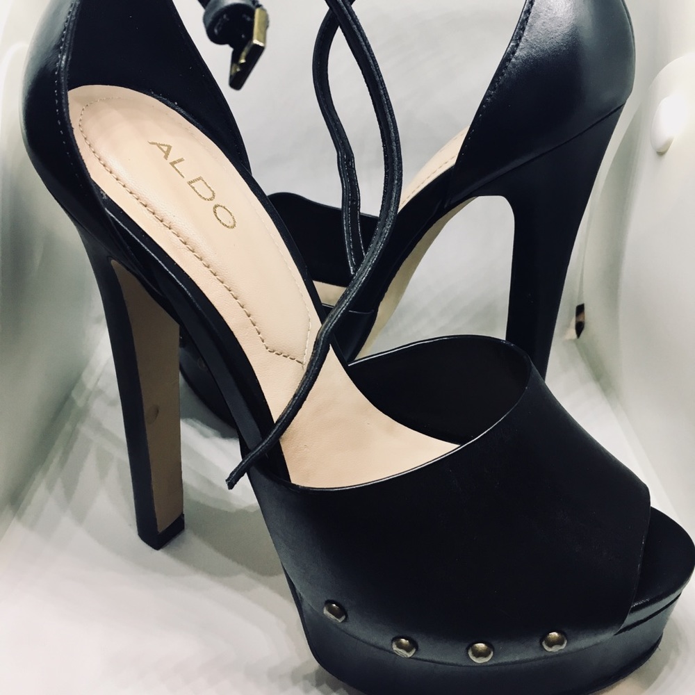 Black high heels with an ankle strap.